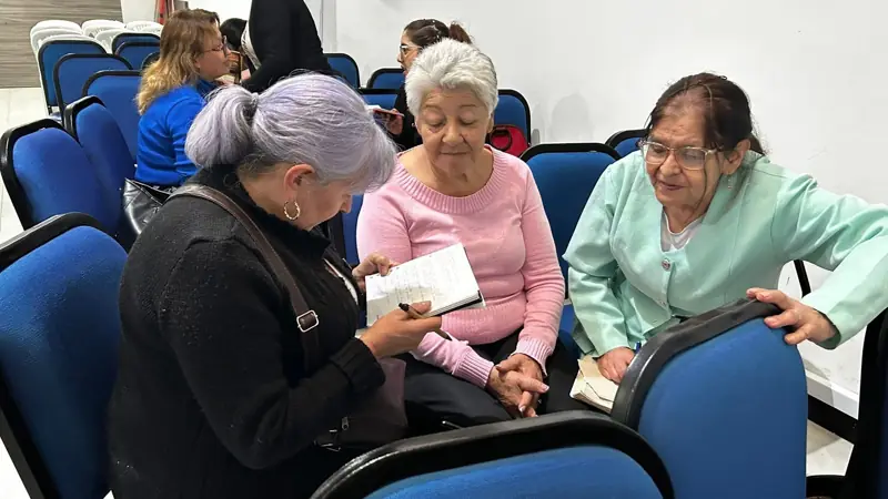 Women reading the Bible together