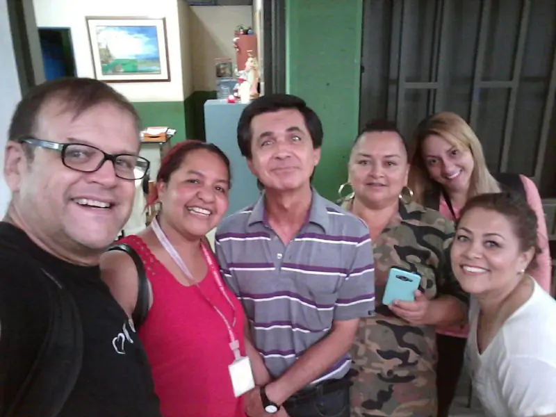 Selfie of a smiling group of adults from the team