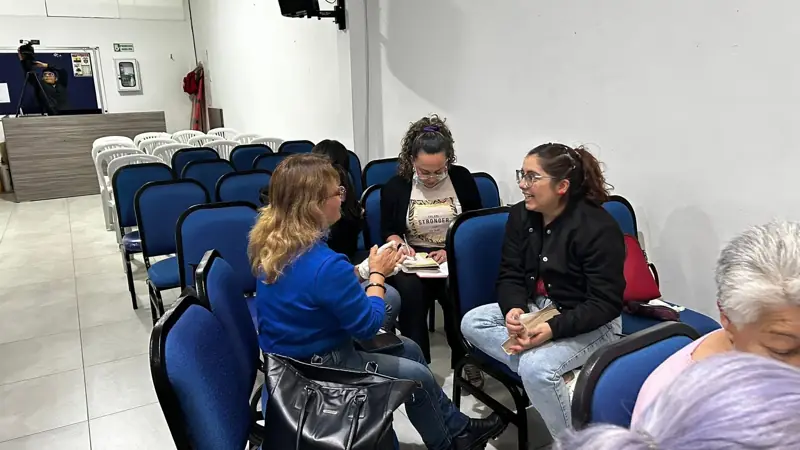 Women talking in a circle during a workshop