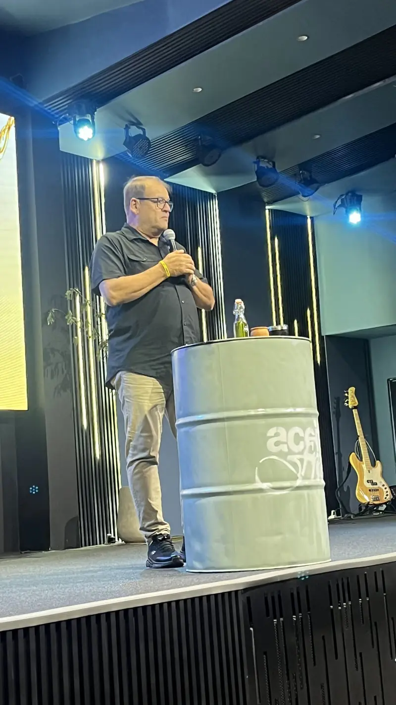 A speaker on a stage